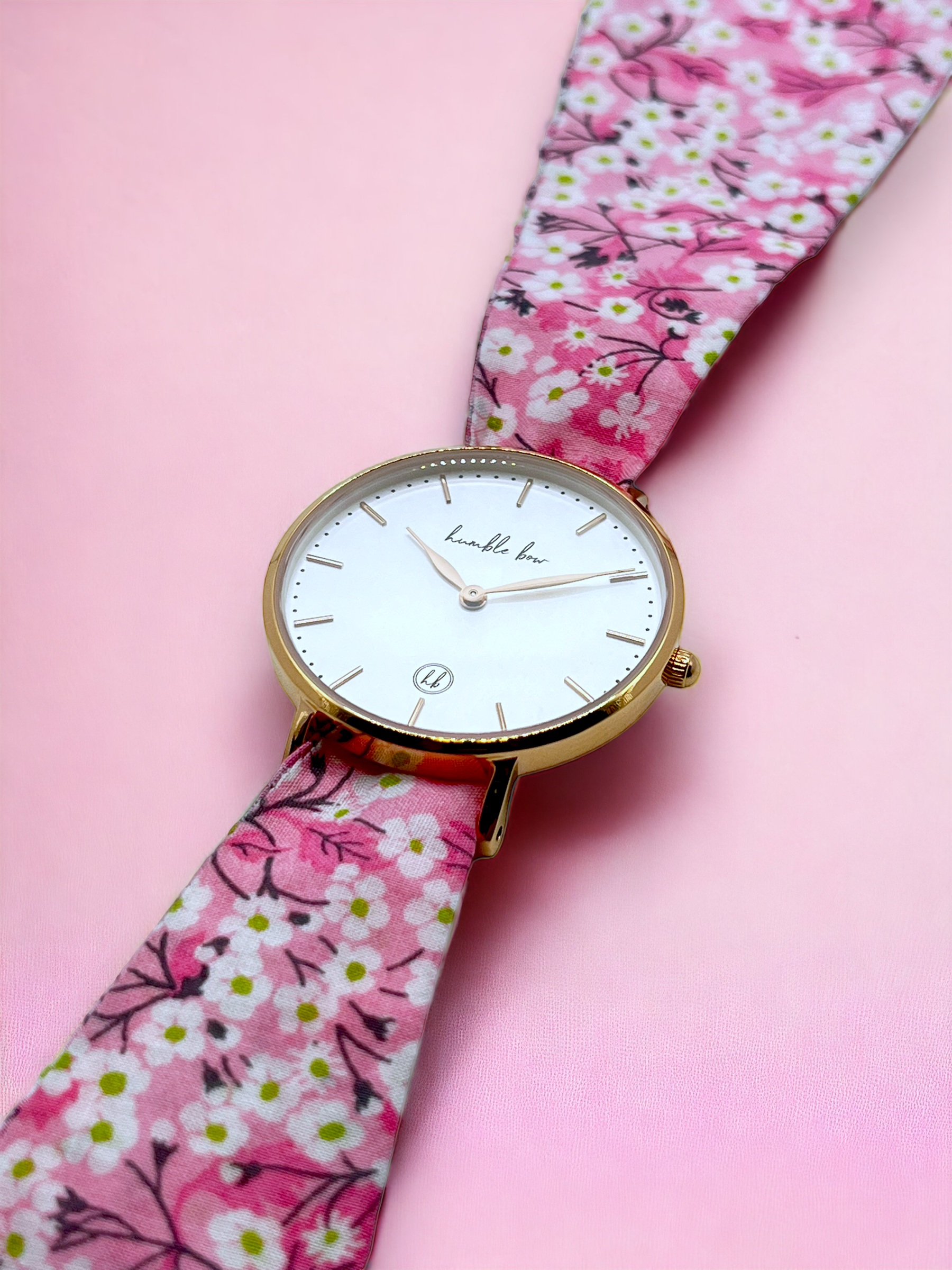 White and 2025 pink watch